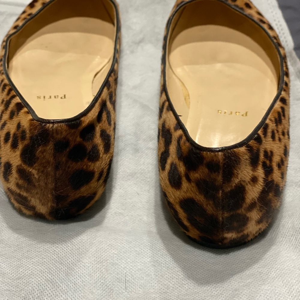 Christian Lou Boutin pony hair flats